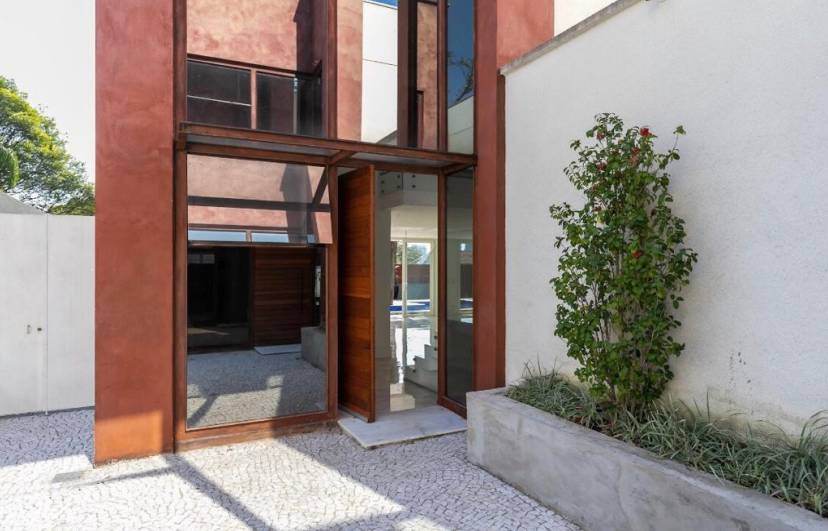 - Casa de condomínio de alto padrão com 786.97m², 4 suítes e 8 vagas à venda no bairro Brooklin.